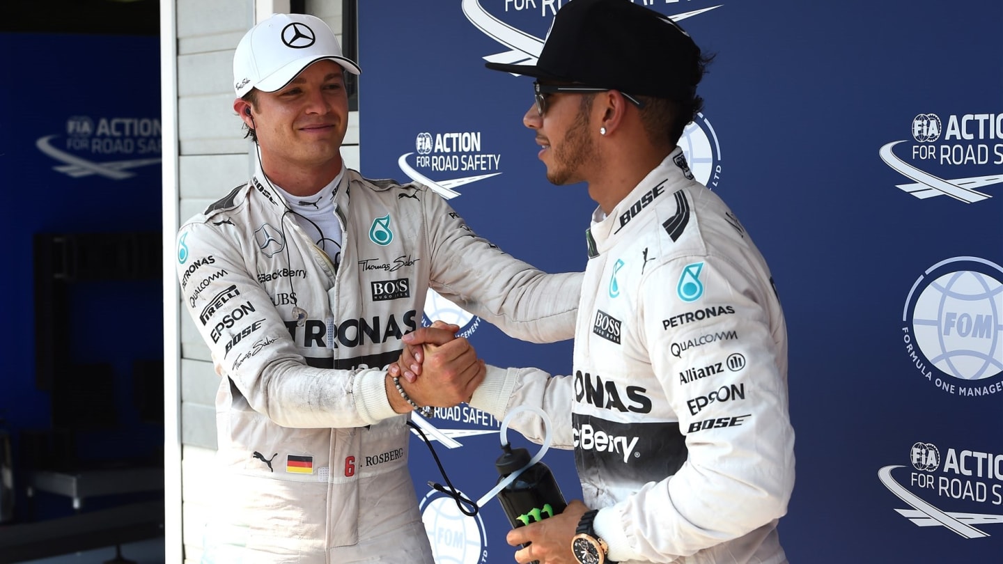 Nico Rosberg (GER) Mercedes AMG F1 congratulates pole sitter Lewis Hamilton (GBR) Mercedes AMG F1