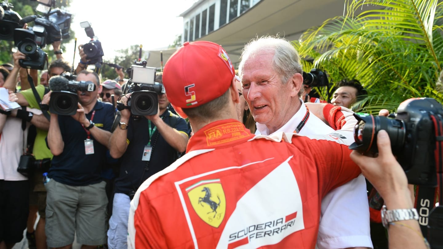 Sebastian Vettel (GER) Ferrari and Dr Helmut Marko (AUT) Red Bull Motorsport Consultant at Formula