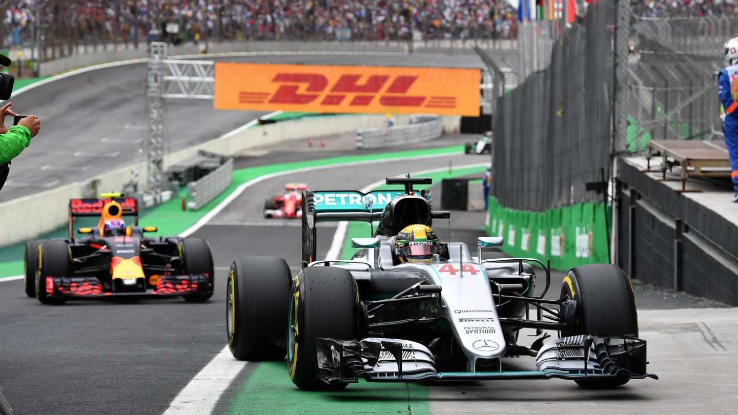Pole sitter Lewis Hamilton (GBR) Mercedes-Benz F1 W07 Hybrid arrives in parc ferme at Formula One