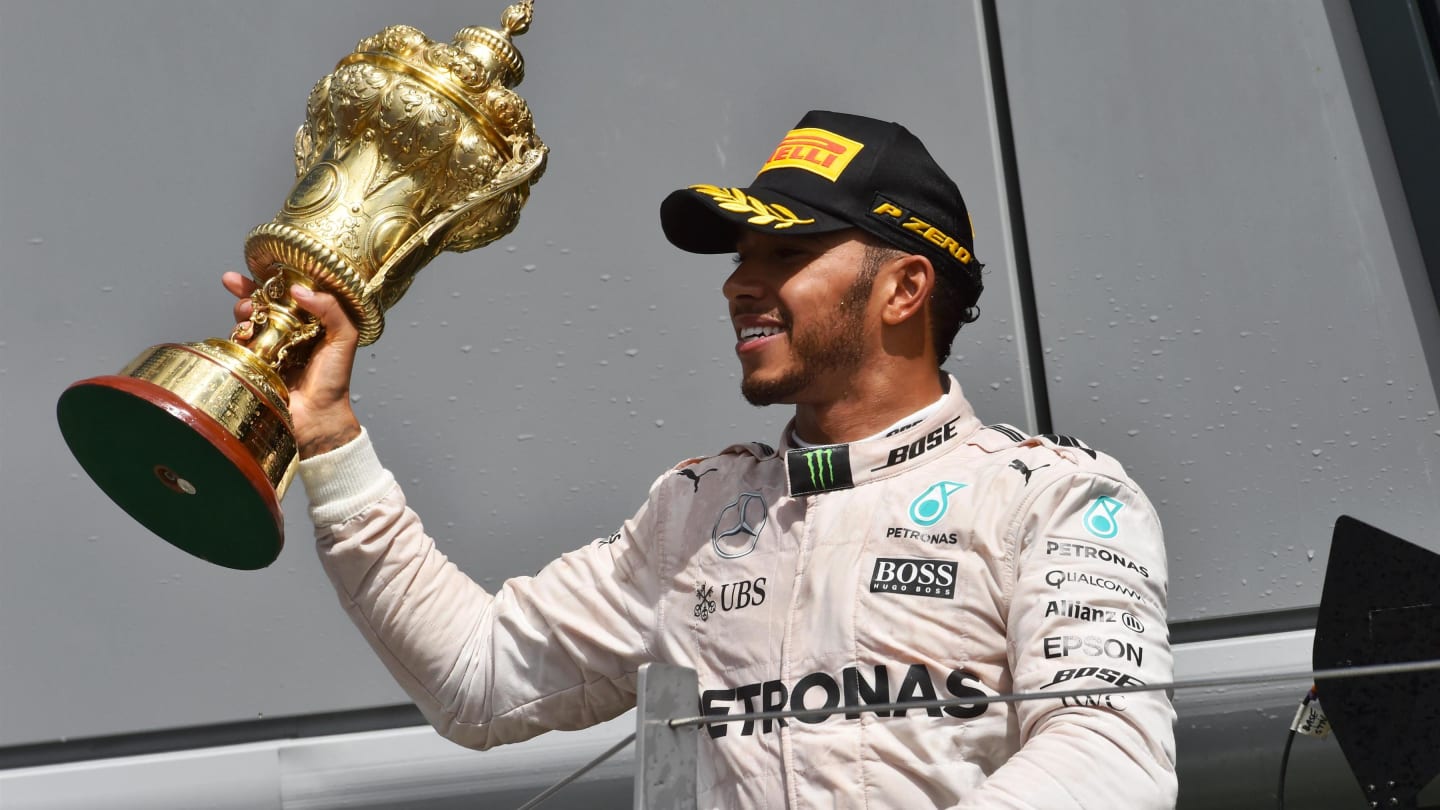 Race winner Lewis Hamilton (GBR) Mercedes AMG F1 celebrates with the trophy at Formula One World