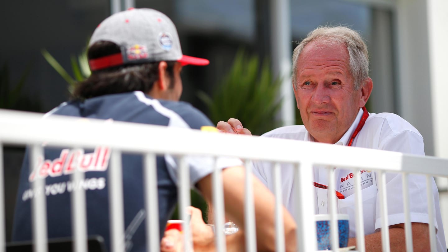 Carlos Sainz jr (ESP) Scuderia Toro Rosso and Dr Helmut Marko (AUT) Red Bull Motorsport Consultant