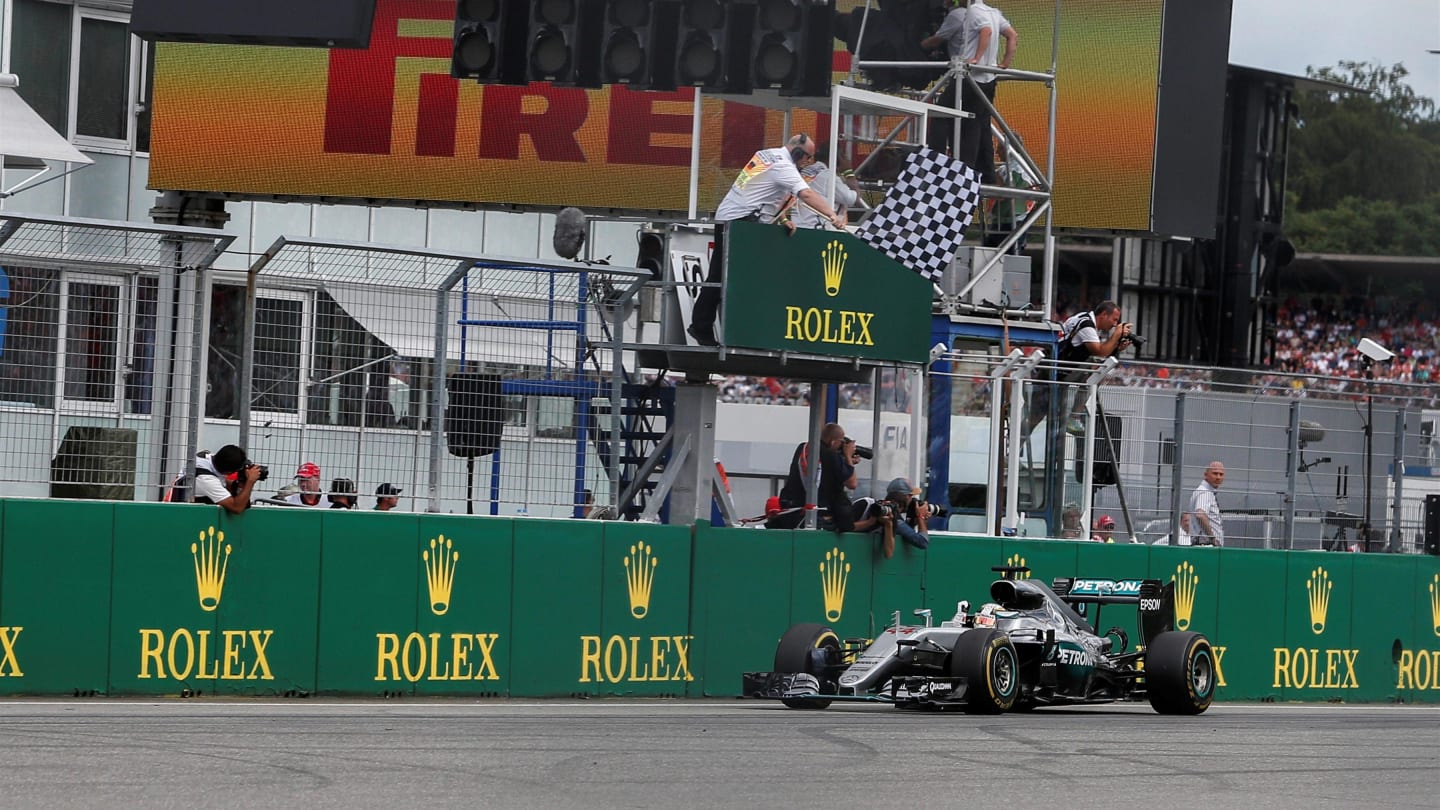 Race winner Lewis Hamilton (GBR) Mercedes-Benz F1 W07 Hybrid takes the chequered flag at Formula