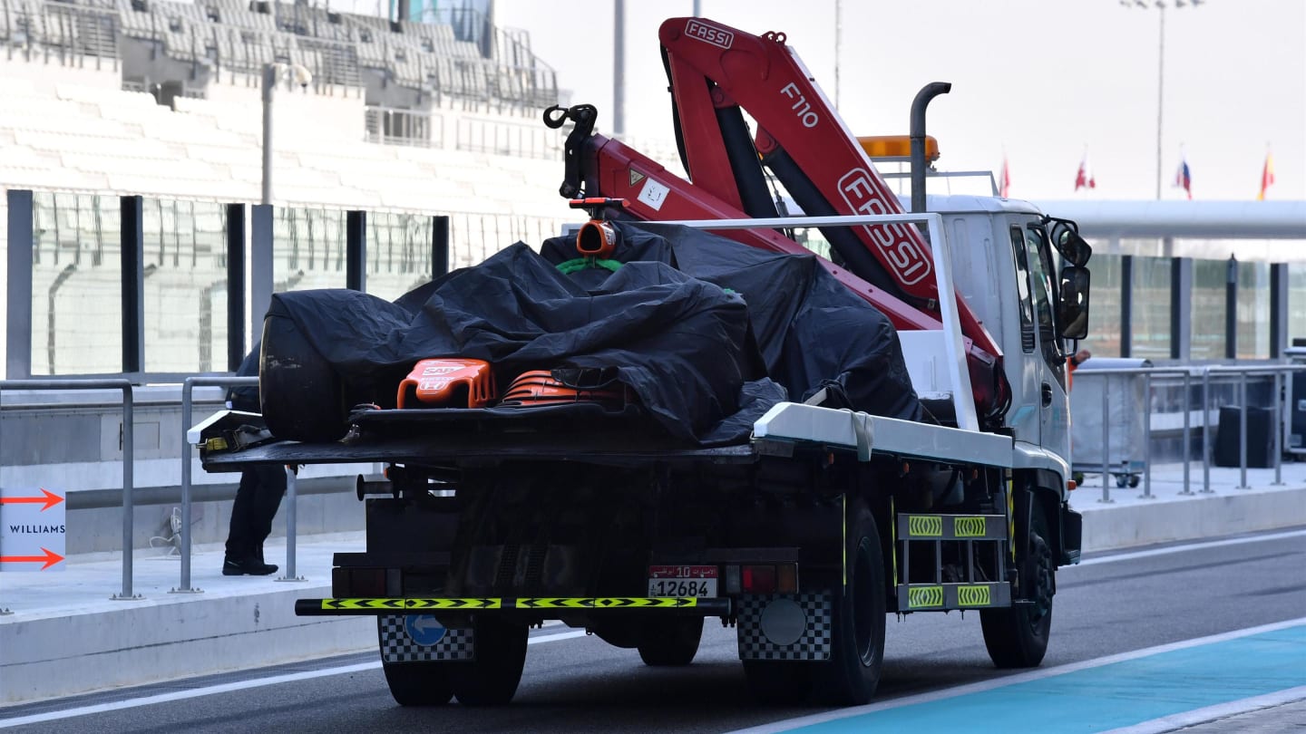 The car of Oliver Turvey (GBR) McLaren MCL32 is recovered to the pits at Formula One Testing, Day One, Yas Marina Circuit, Abu Dhabi, UAE, Tuesday 28 November 2017. © Mark Sutton/Sutton Images