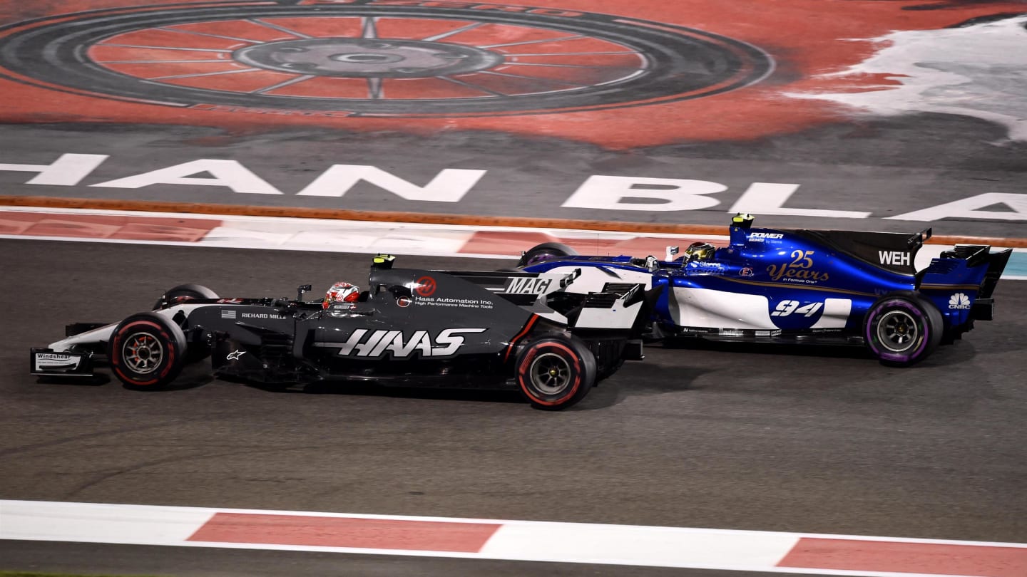 Kevin Magnussen (DEN) Haas VF-17 and Pascal Wehrlein (GER) Sauber C36 battle for position at Formula One World Championship, Rd20, Abu Dhabi Grand Prix, Race, Yas Marina Circuit, Abu Dhabi, UAE, Sunday 26 November 2017. © Simon Galloway/Sutton Images