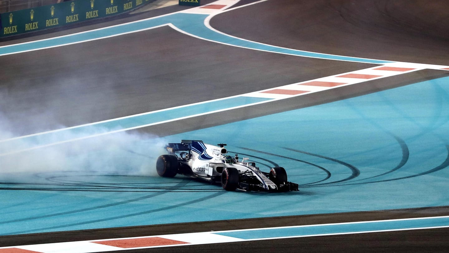 Massa (BRA) Williams FW40 celebrates his last race grand prix race and performs donuts in parc ferme at Formula One World Championship, Rd20, Abu Dhabi Grand Prix, Race, Yas Marina Circuit, Abu Dhabi, UAE, Sunday 26 November 2017. © Lionel Ng/Sutton Images