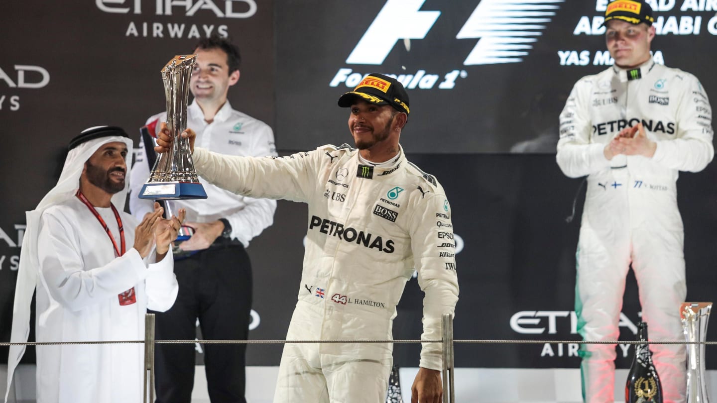 Lewis Hamilton (GBR) Mercedes AMG F1 celebrates on the podium at Formula One World Championship, Rd20, Abu Dhabi Grand Prix, Race, Yas Marina Circuit, Abu Dhabi, UAE, Sunday 26 November 2017. © Manuel Goria/Sutton Images