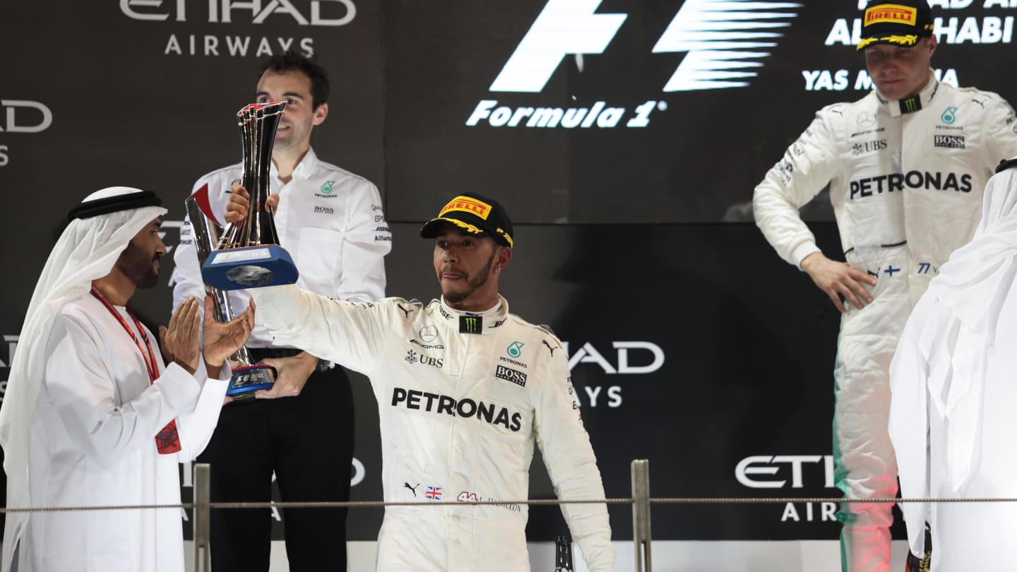 Lewis Hamilton (GBR) Mercedes AMG F1 celebrates on the podium at Formula One World Championship, Rd20, Abu Dhabi Grand Prix, Race, Yas Marina Circuit, Abu Dhabi, UAE, Sunday 26 November 2017. © Manuel Goria/Sutton Images