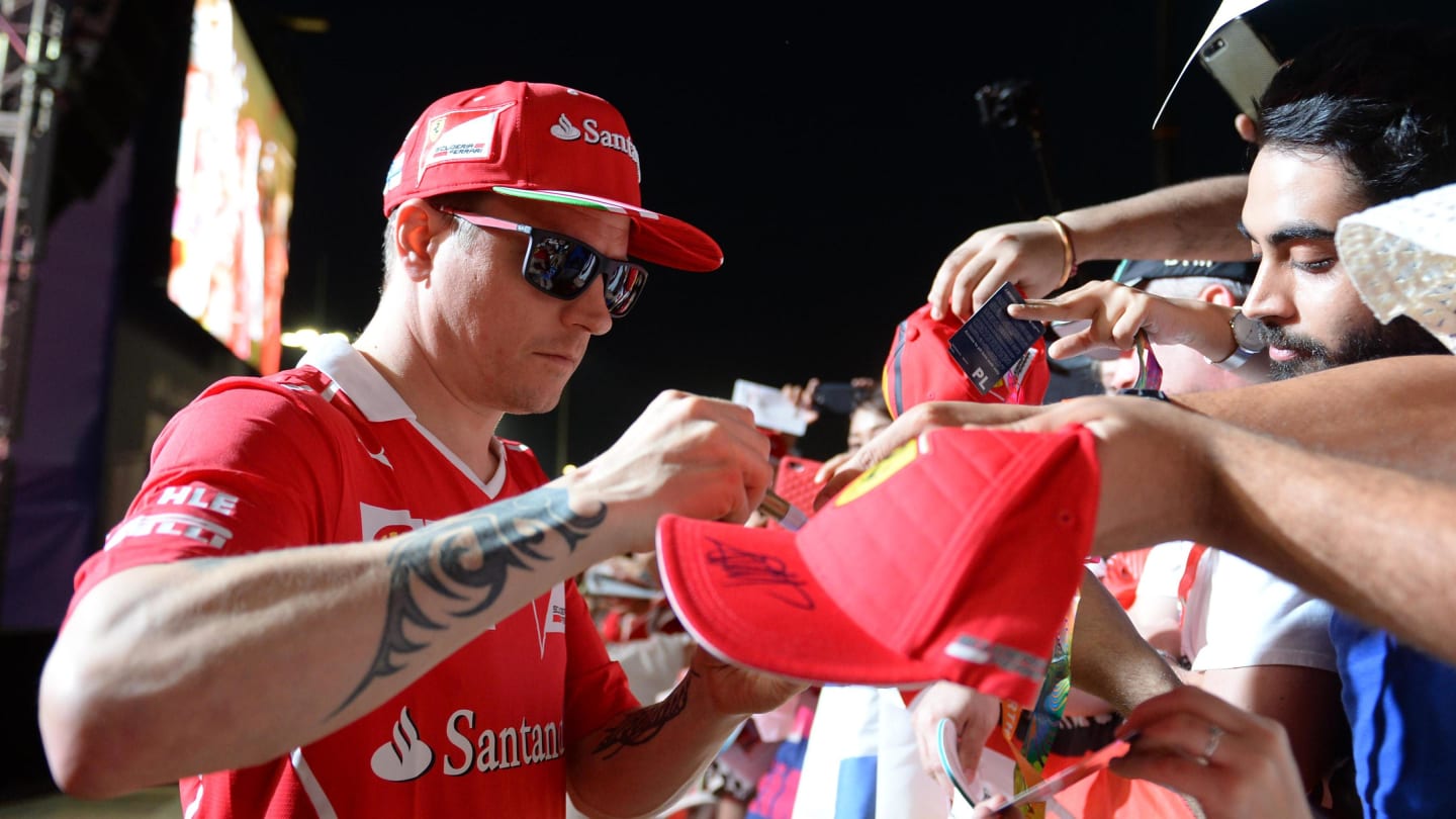 Kimi Raikkonen (FIN) Ferrari signs autographs for the fans at Formula One World Championship, Rd20, Abu Dhabi Grand Prix, Preparations, Yas Marina Circuit, Abu Dhabi, UAE, Thursday 23 November 2017. © Simon Galloway/Sutton Images