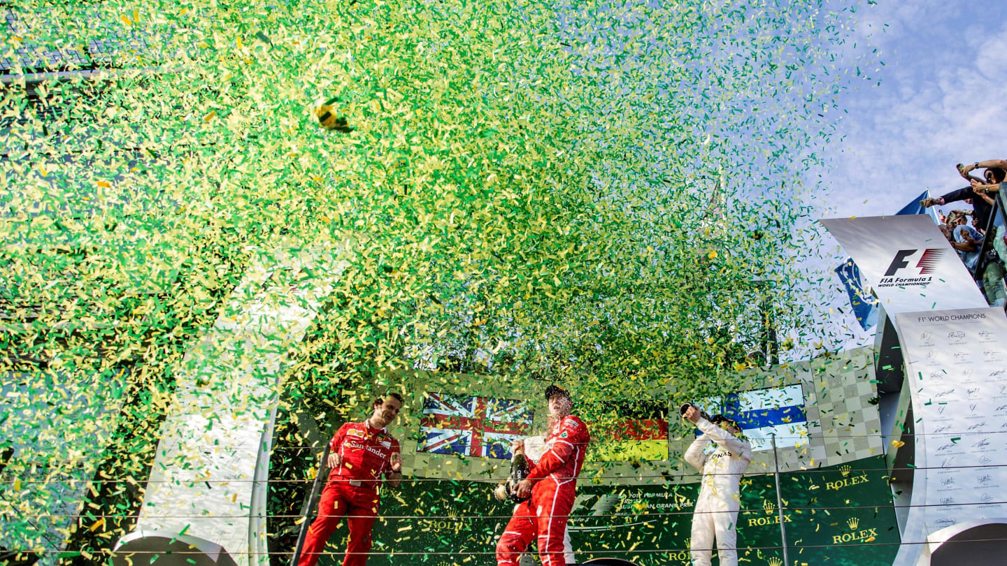 Race winners Ferrari and Mercedes AMG F1 celebrate on the podium with the champagne at Formula One World Championship, Rd1, Australian Grand Prix, Race, Albert Park, Melbourne, Australia, Sunday 26 March 2017. © Sutton Motorsport Images