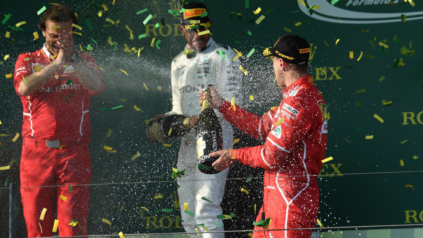Lewis Hamilton (GBR) Mercedes AMG and Sebastian Vettel (GER) Ferrari celebrate on the podium with the champagne at Formula One World Championship, Australian Grand Prix, Albert Park, Melbourne, Australia, Sunday 26 March 2017. © Sutton Motorsport Images