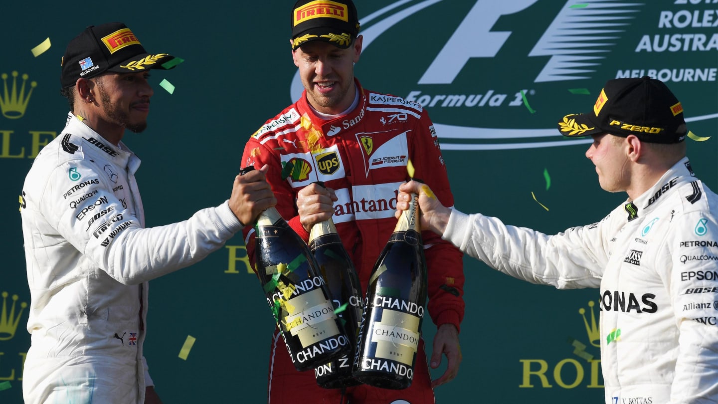 Ferrari and Mercedes AMG F1 celebrate on the podium with the champagne at Formula One World Championship, Rd1, Australian Grand Prix, Race, Albert Park, Melbourne, Australia, Sunday 26 March 2017. © Sutton Motorsport Images