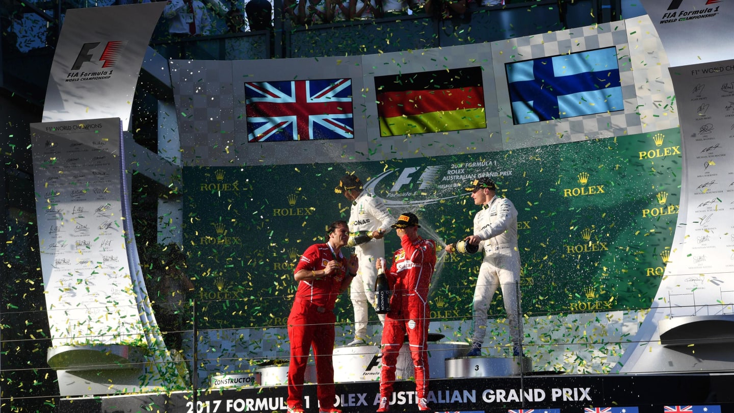 Race winner Ferrari and Mercedes AMG F1 celebrate on the podium with the champagne at Formula One World Championship, Rd1, Australian Grand Prix, Race, Albert Park, Melbourne, Australia, Sunday 26 March 2017. © Sutton Motorsport Images