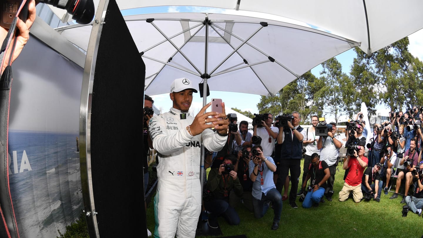 Lewis Hamilton (GBR) Mercedes AMG F1 at the portrait session with his phone at Formula One World Championship, Rd1, Australian Grand Prix, Preparations, Albert Park, Melbourne, Australia, Thursday 23 March 2017. © Sutton Motorsport Images