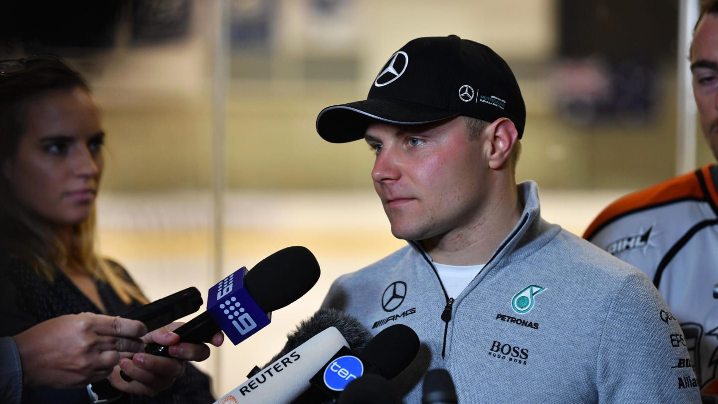 Valtteri Bottas (FIN) Mercedes AMG F1 takes part in an ice hockey skllls session with Melbourne Ice