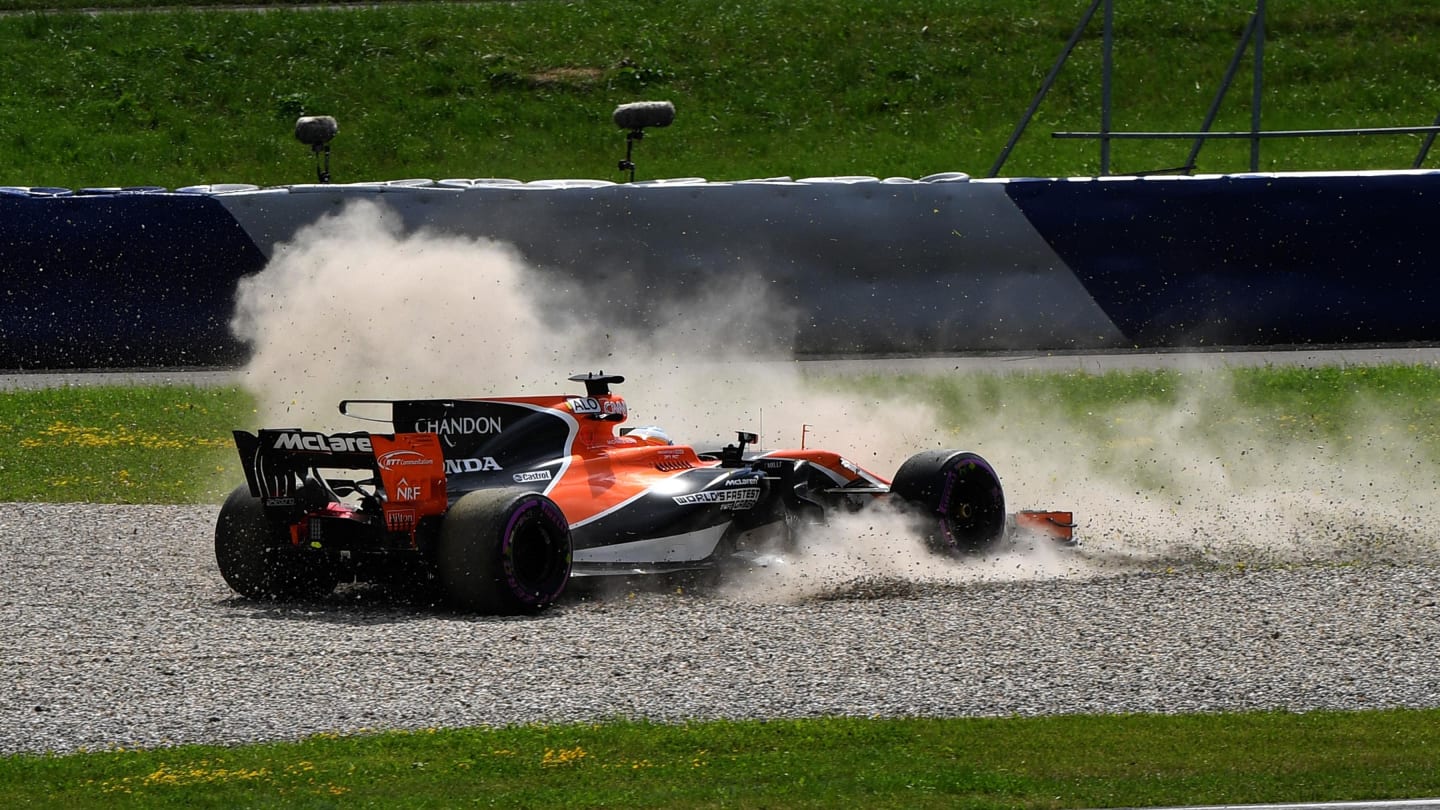 Fernando Alonso (ESP) McLaren MCL32 spins into the gravel at Formula One World Championship, Rd9, Austrian Grand Prix, Practice, Spielberg, Austria, Friday 7 July 2017. © Sutton Images