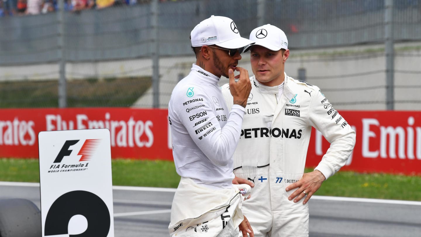 Pole siter Valtteri Bottas (FIN) Mercedes AMG F1 and Lewis Hamilton (GBR) Mercedes AMG F1 after Qualifying at Formula One World Championship, Rd9, Austrian Grand Prix, Qualifying, Spielberg, Austria, Saturday 8 July 2017. © Sutton Images