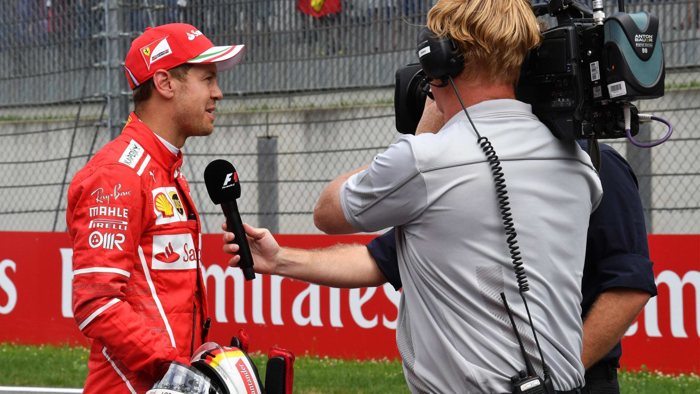 Davide Valsecchi (ITA) Sky Italia talks with Sebastian Vettel (GER) Ferrari after Qualifying at Formula One World Championship, Rd9, Austrian Grand Prix, Qualifying, Spielberg, Austria, Saturday 8 July 2017. © Sutton Images