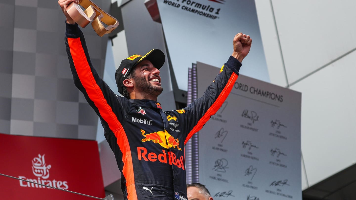 Daniel Ricciardo (AUS) Red Bull Racing celebrates with the trophy on the podium at Formula One