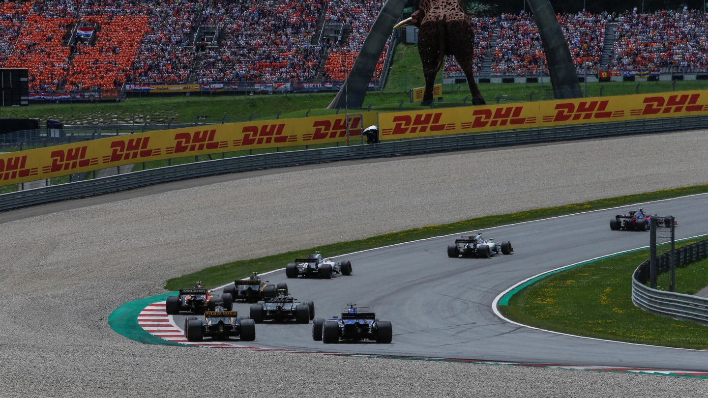 Lap one action at Formula One World Championship, Rd9, Austrian Grand Prix, Race, Spielberg,