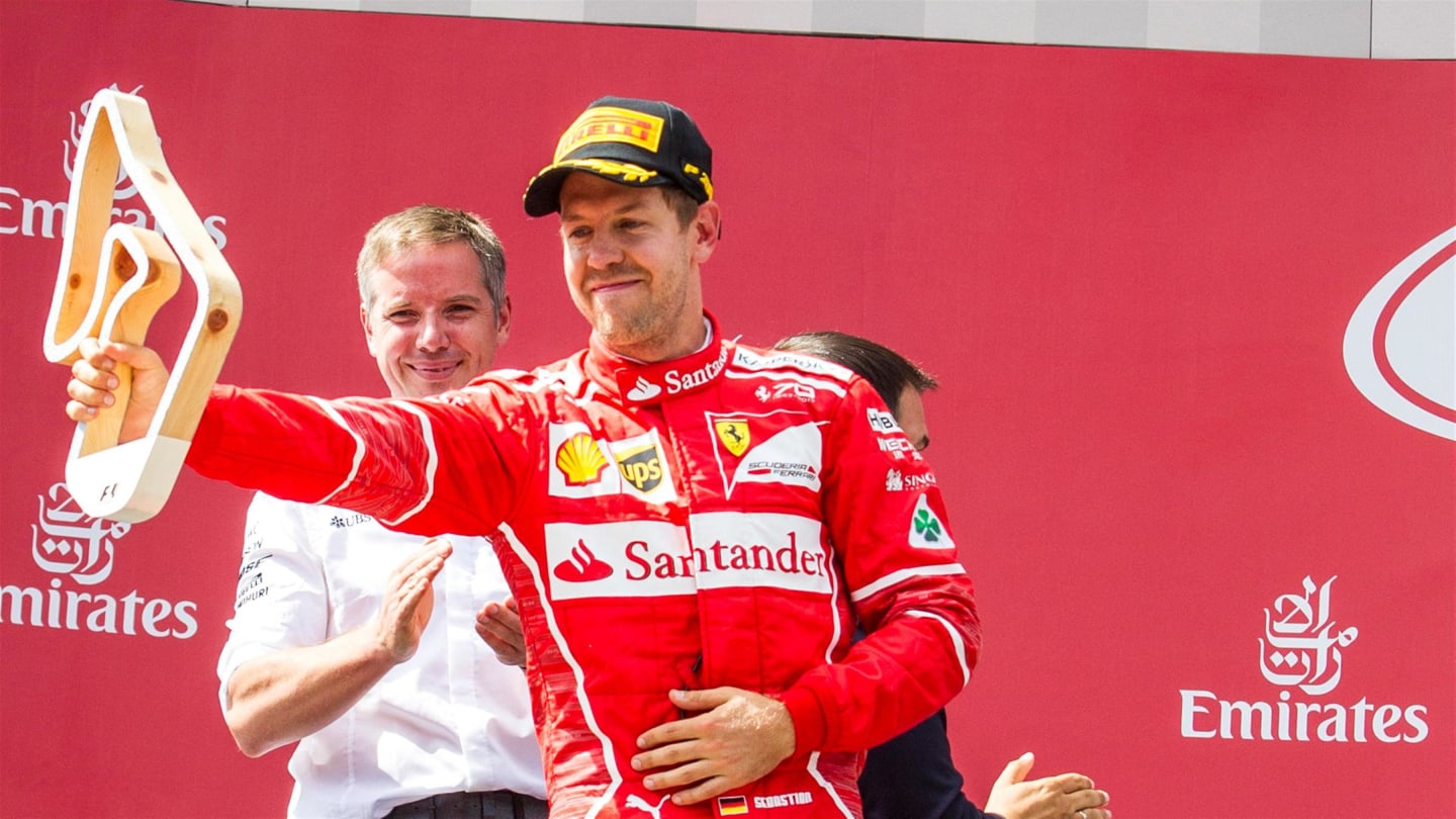 Sebastian Vettel (GER) Ferrari celebrates on the podium with the trophy at Formula One World Championship, Rd9, Austrian Grand Prix, Race, Spielberg, Austria, Sunday 9 July 2017. © Sutton Images