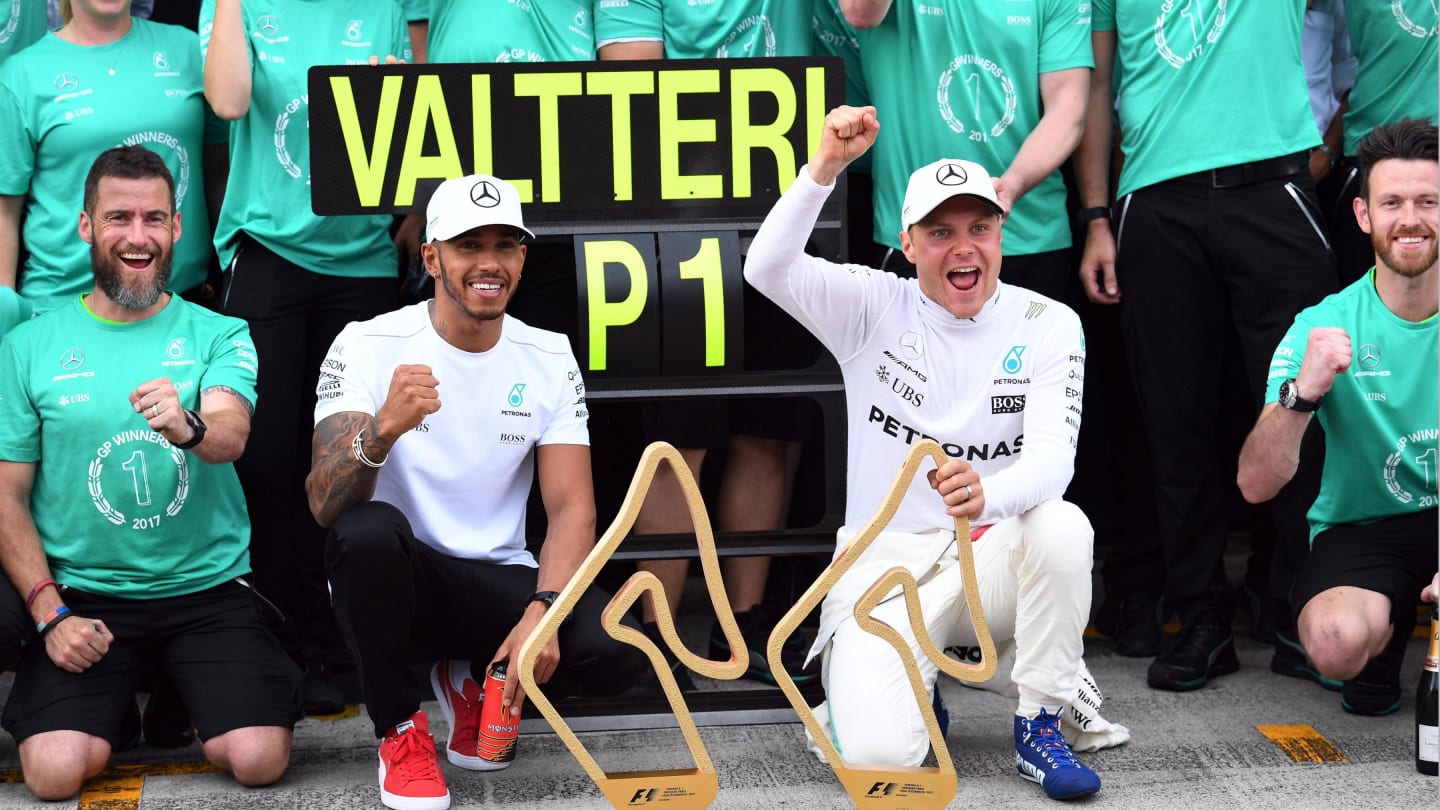 Race winner Valtteri Bottas (FIN) Mercedes AMG F1 celebrates with Lewis Hamilton (GBR) Mercedes AMG F1 and the team at Formula One World Championship, Rd9, Austrian Grand Prix, Race, Spielberg, Austria, Sunday 9 July 2017. © Sutton Images