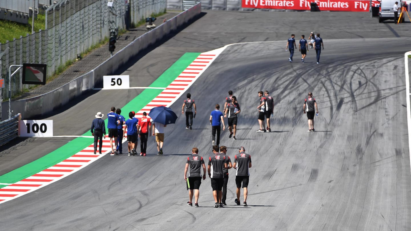 Romain Grosjean (FRA) Haas F1 walks the track with the team at Formula One World Championship, Rd9, Austrian Grand Prix, Preparations, Spielberg, Austria, Thursday 6 July 2017. © Sutton Images