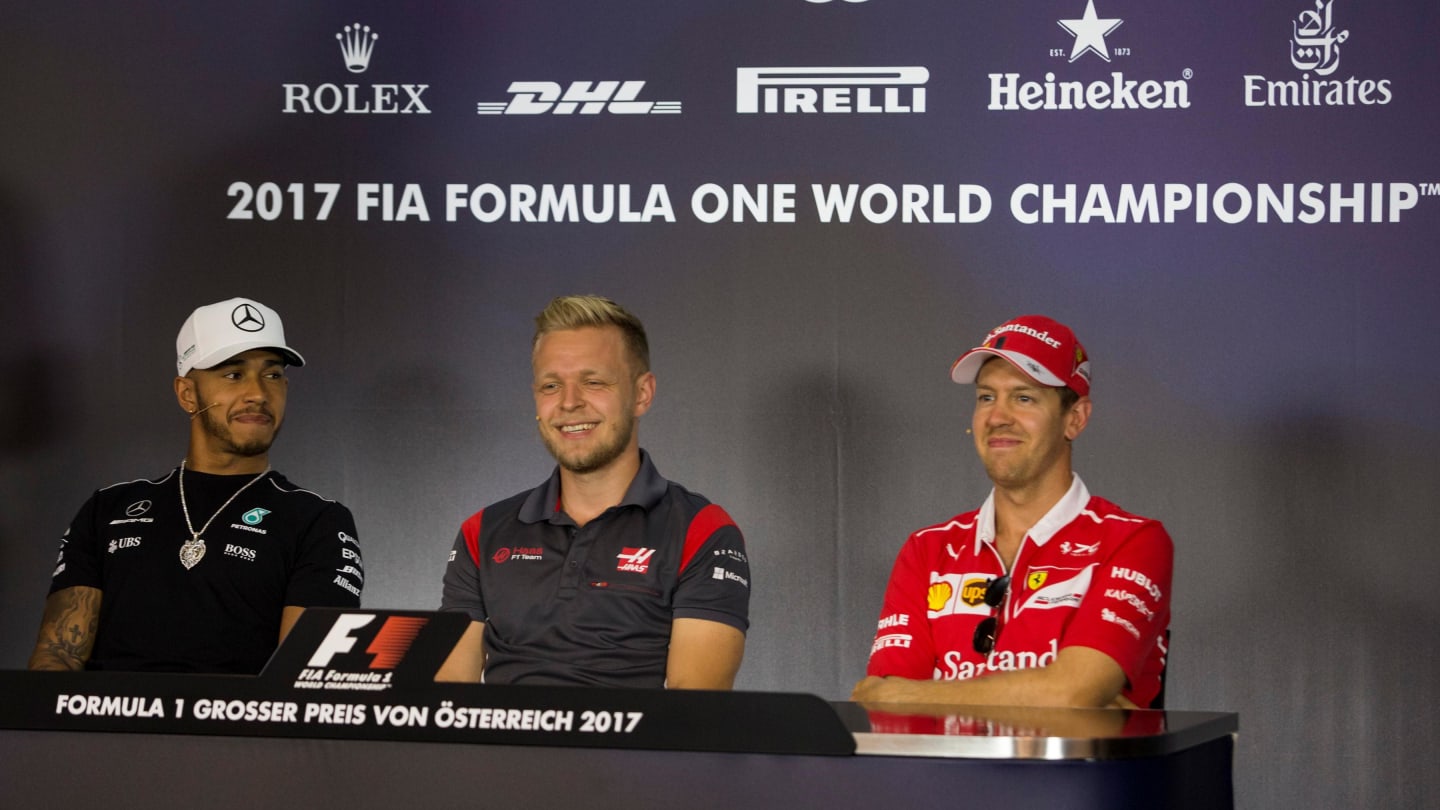 Lewis Hamilton (GBR) Mercedes AMG F1, Kevin Magnussen (DEN) Haas F1 and Sebastian Vettel (GER)