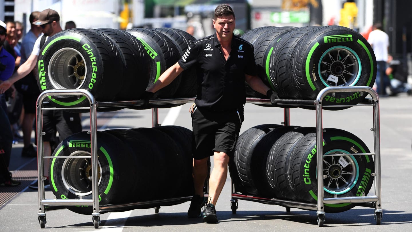 Mercedes AMG F1 mechanic and Pirelli tyres at Formula One World Championship, Rd9, Austrian Grand Prix, Preparations, Spielberg, Austria, Thursday 6 July 2017. © Sutton Images