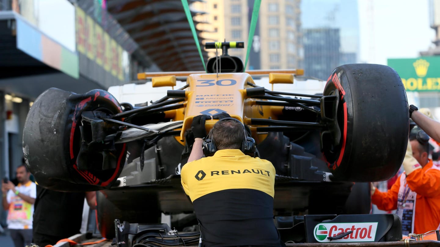 The crashed car of Jolyon Palmer (GBR) Renault Sport F1 Team RS17 is recovered in FP2 at Formula