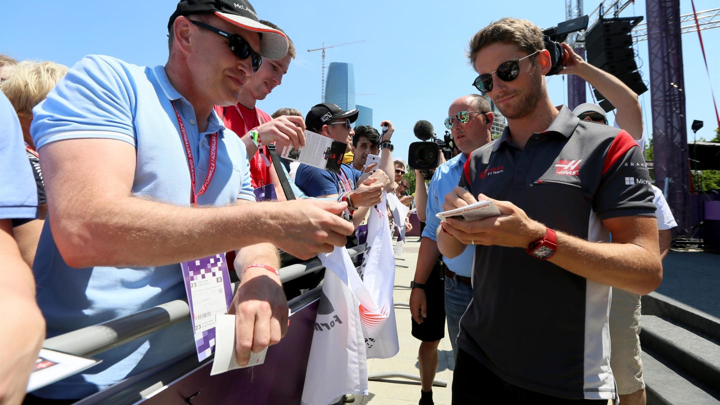 Romain Grosjean (FRA) Haas F1 signs autographs for the fans at Formula One World Championship, Rd8, Azerbaijan Grand Prix, Preparations, Baku City Circuit, Baku, Azerbaijan, Thursday 22 June 2017. © Sutton Images
