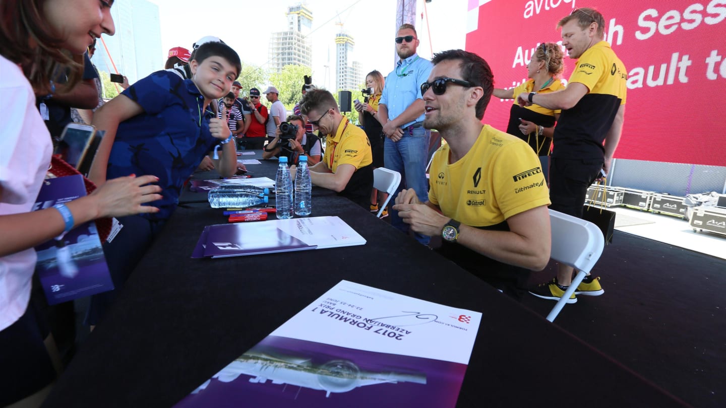 Jolyon Palmer (GBR) Renault Sport F1 Team RS17 signs autographs for the fans at the autograph session at Formula One World Championship, Rd8, Azerbaijan Grand Prix, Qualifying, Baku City Circuit, Baku, Azerbaijan, Saturday 24 June 2017. © Sutton Images
