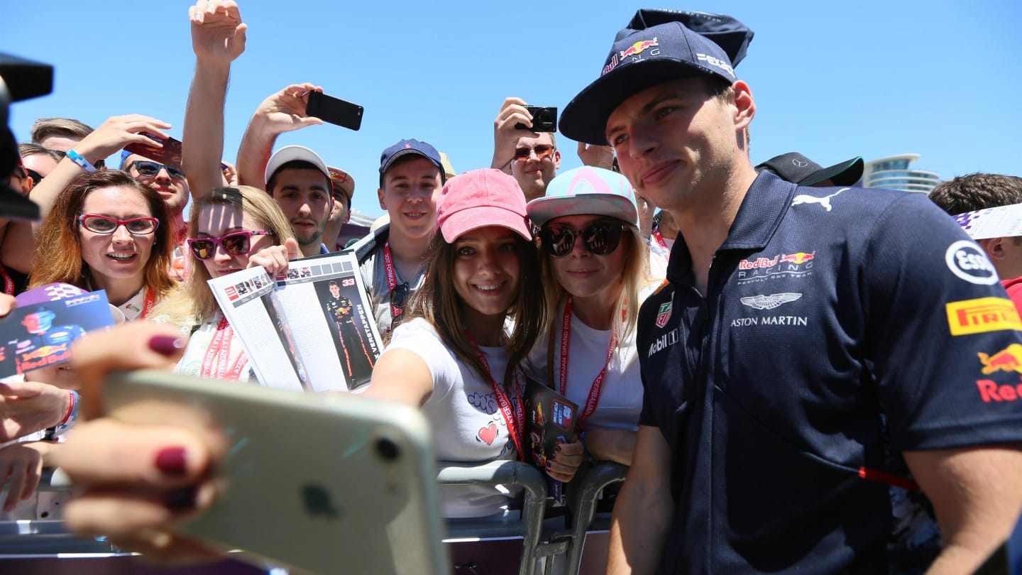 Max Verstappen (NED) Red Bull Racing poses for a selfie photo with the fans at Formula One World