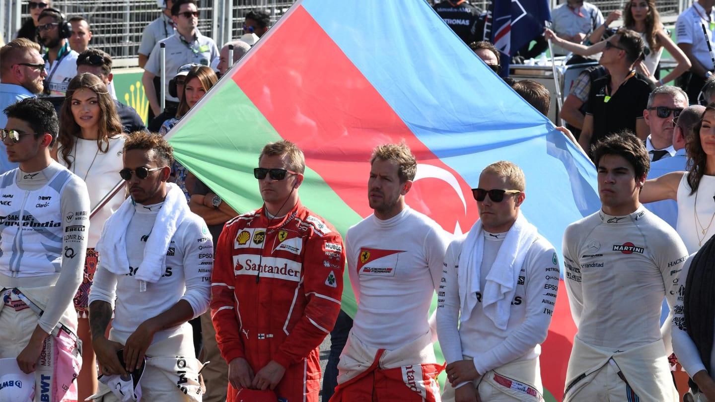Drivers observe the national anthem on the grid at Formula One World Championship, Rd8, Azerbaijan Grand Prix, Race, Baku City Circuit, Baku, Azerbaijan, Sunday 25 June 2017. © Sutton Images