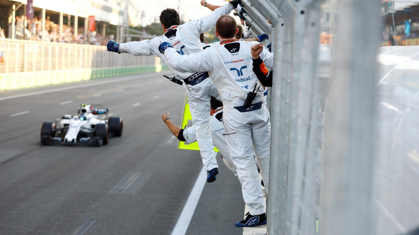 Lance Stroll (CDN) Williams FW40 crosses the line for third place at Formula One World