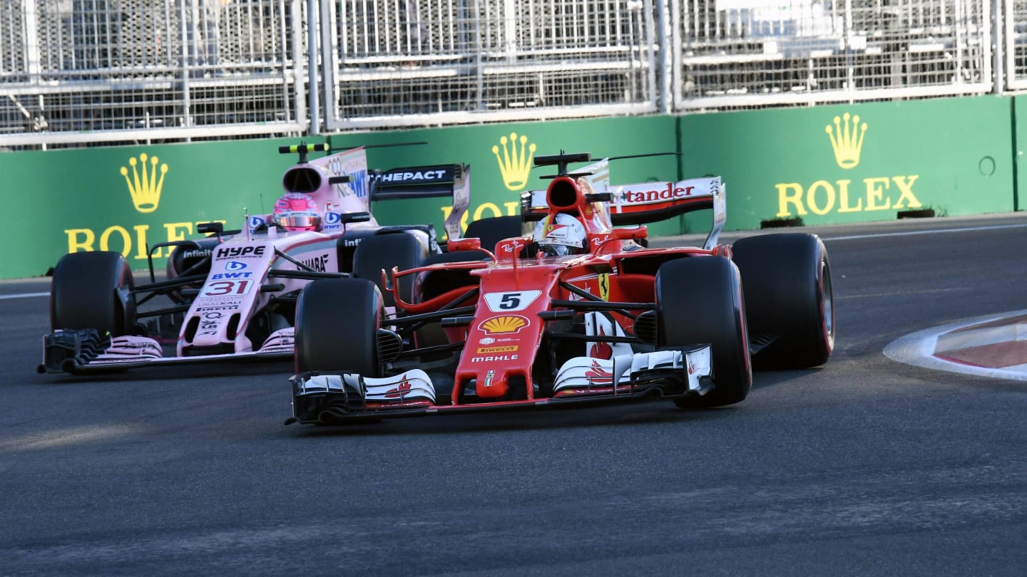 Sebastian Vettel (GER) Ferrari SF70-H and Esteban Ocon (FRA) Force India VJM10 at Formula One World Championship, Rd8, Azerbaijan Grand Prix, Race, Baku City Circuit, Baku, Azerbaijan, Sunday 25 June 2017. © Sutton Images
