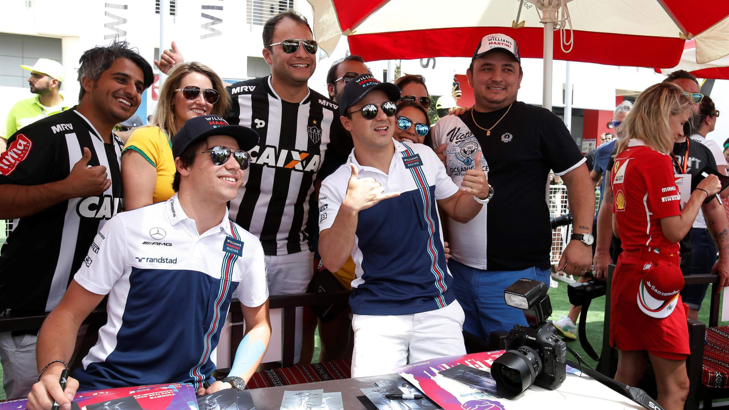 Lance Stroll (CDN) Williams and Felipe Massa (BRA) Williams pose a fans photo at Formula One World