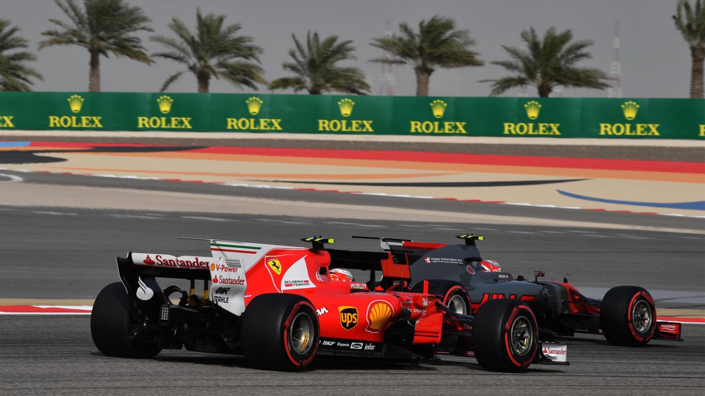Kimi Raikkonen (FIN) Ferrari SF70-H and Kevin Magnussen (DEN) Haas VF-17 at Formula One World Championship, Rd3, Bahrain Grand Prix Qualifying, Bahrain International Circuit, Sakhir, Bahrain, Saturday 15 April 2017. © Sutton Motorsport Images