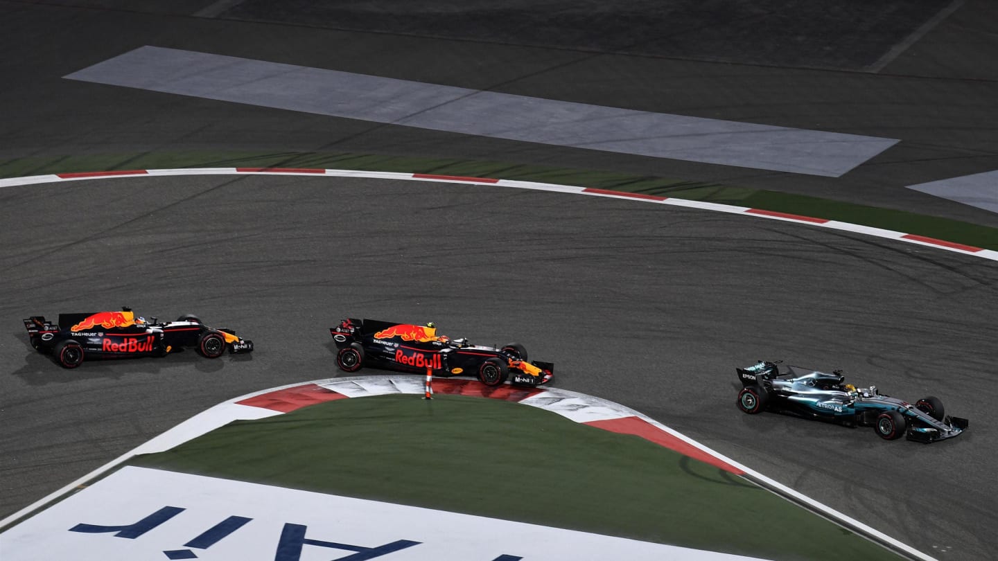 Hamilton (GBR) Mercedes W08 Hybrid leads Verstappen (NED) Red Bull Racing RB13 and Ricciardo (AUS) Red Bull RB13 at F1 World Championship, Bahrain Grand Prix Race, Bahrain International Circuit, Sakhir, Bahrain,16 April 2017. ©Sutton Motorsport Images