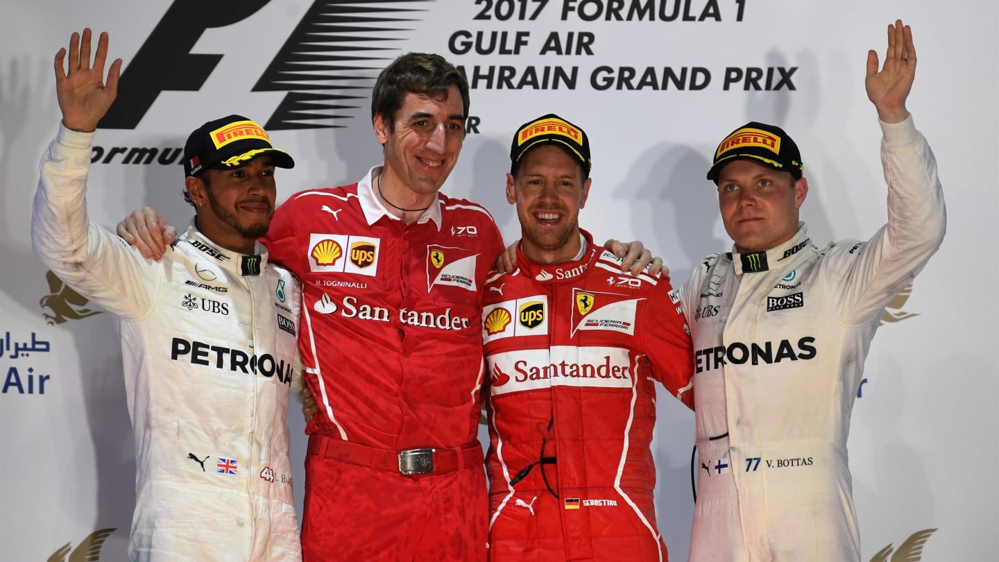 (L to R): Lewis Hamilton (GBR) Mercedes AMG F1, MatteoTogninalli (ITA) Ferrari Chief Race Engineer, Sebastian Vettel (GER) Ferrari and Valtteri Bottas (FIN) Mercedes AMG F1 celebrate on the podium at Formula One World Championship, Rd3, Bahrain Grand Pr