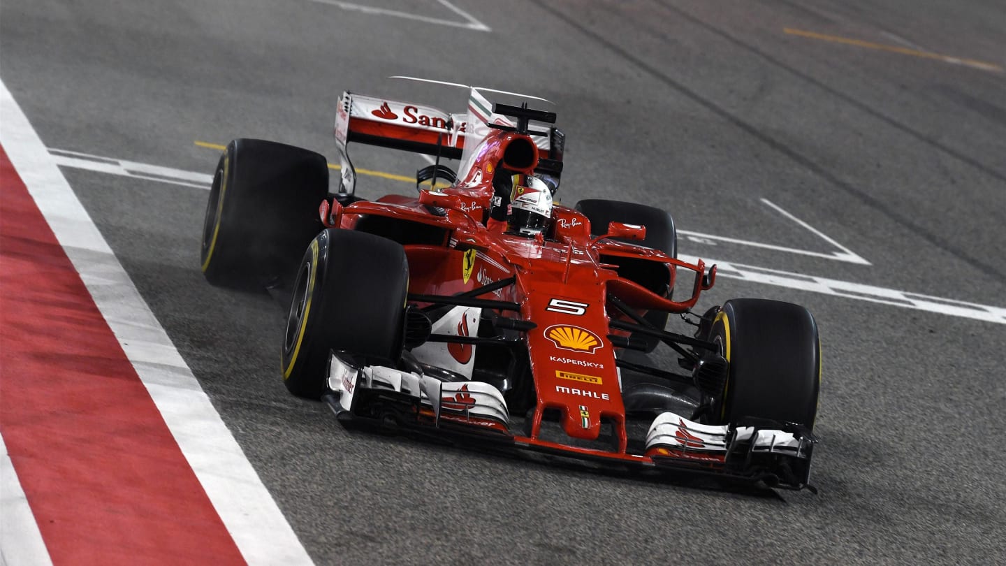 Race winner Sebastian Vettel (GER) Ferrari SF70-H crosses the line at Formula One World Championship, Rd3, Bahrain Grand Prix Race, Bahrain International Circuit, Sakhir, Bahrain, Sunday 16 April 2017. © Sutton Motorsport Images