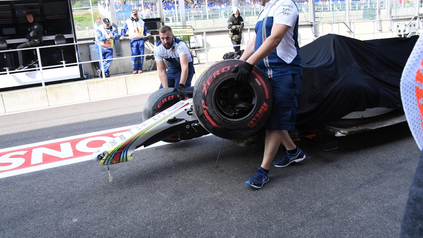 The crashed car of Felipe Massa (BRA) Williams FW40 is recovered in FP1 and pushed down pitlane by mechanics at Formula One World Championship, Rd12, Belgian Grand Prix, Practice, Spa Francorchamps, Belgium, Friday 25 August 2017. © Sutton Images