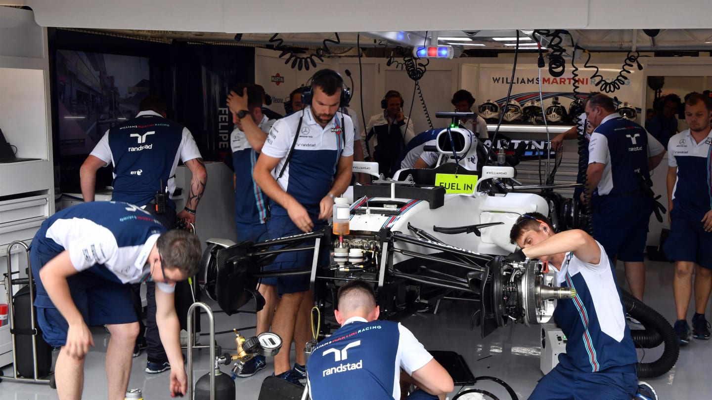 Mechanics work on the car of Felipe Massa (BRA) Williams FW40 in the garage at Formula One World Championship, Rd12, Belgian Grand Prix, Practice, Spa Francorchamps, Belgium, Friday 25 August 2017. © Sutton Images
