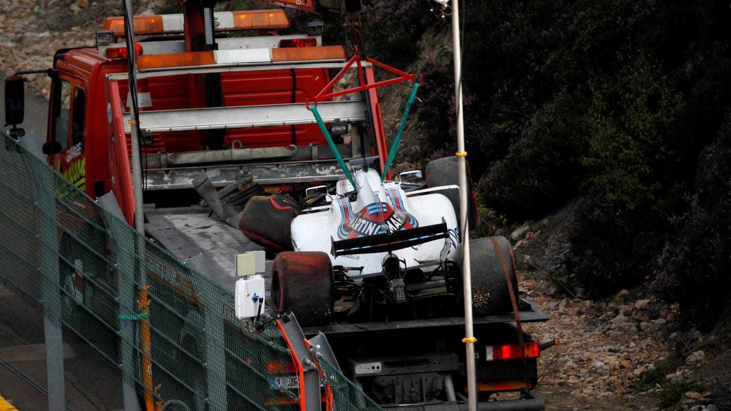 The crashed car of Felipe Massa (BRA) Williams FW40 is recovered in FP1 at Formula One World