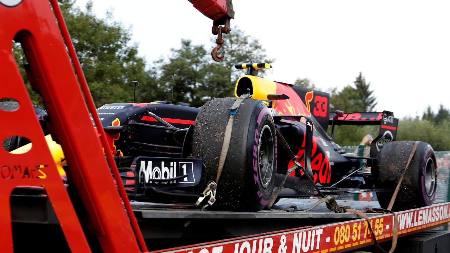 The car of Max Verstappen (NED) Red Bull Racing RB13 is recovered after stopping on track at
