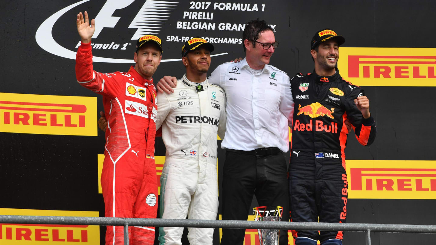 (L to R): Sebastian Vettel (GER) Ferrari, Lewis Hamilton (GBR) Mercedes AMG F1, Andy Shovlin (GBR) Mercedes AMG F1 Race Engineer and Daniel Ricciardo (AUS) Red Bull Racing celebrate on the podium at Formula One World Championship, Rd12, Belgian Grand Prix
