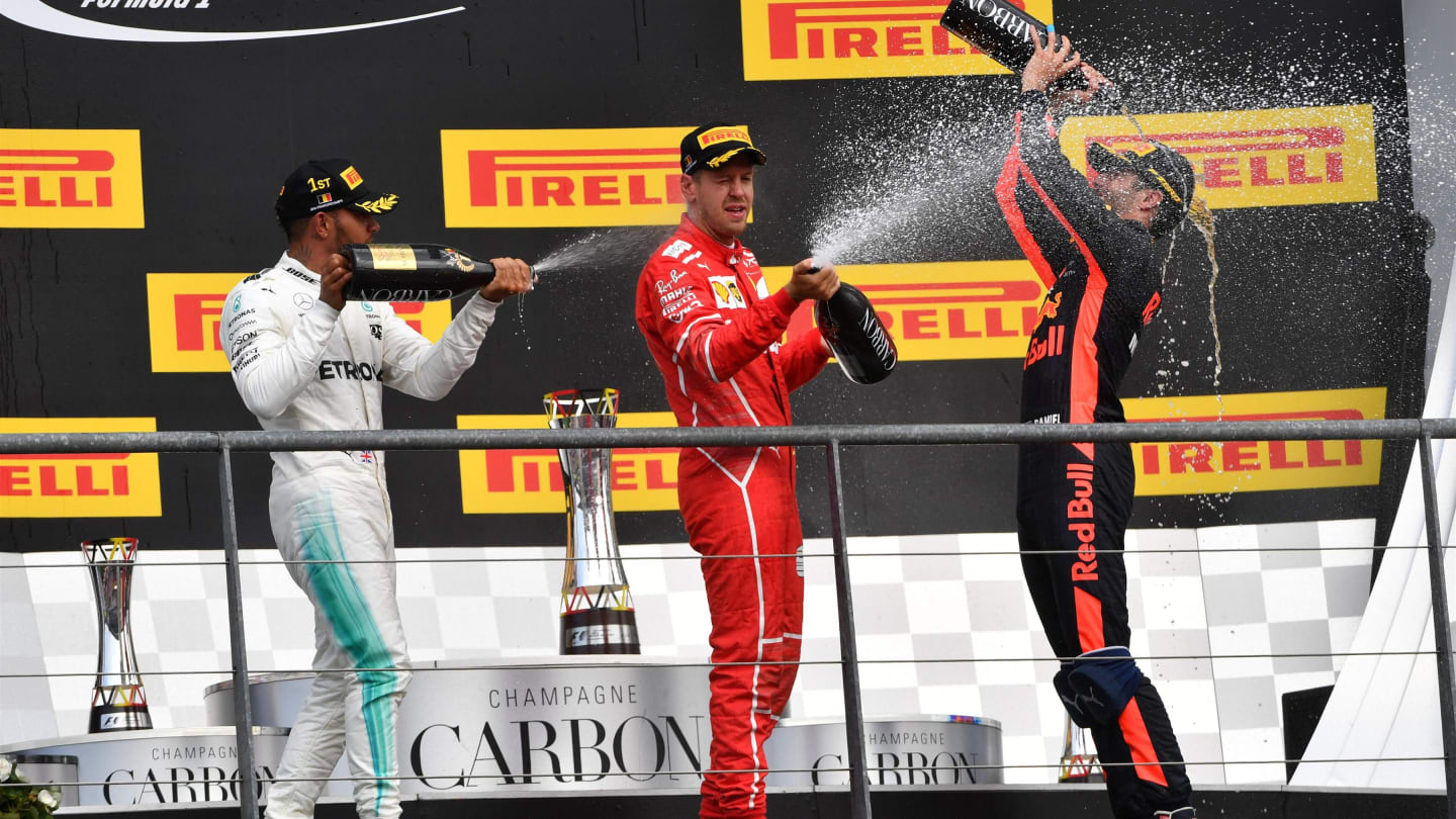 Race winner Lewis Hamilton (GBR) Mercedes AMG F1 celebrates on the podium with Sebastian Vettel (GER) Ferrari and Daniel Ricciardo (AUS) Red Bull Racing with the champagne at Formula One World Championship, Rd12, Belgian Grand Prix, Race, Spa Francorchamps, Belgium, Sunday 27 August 2017. © Sutton Images