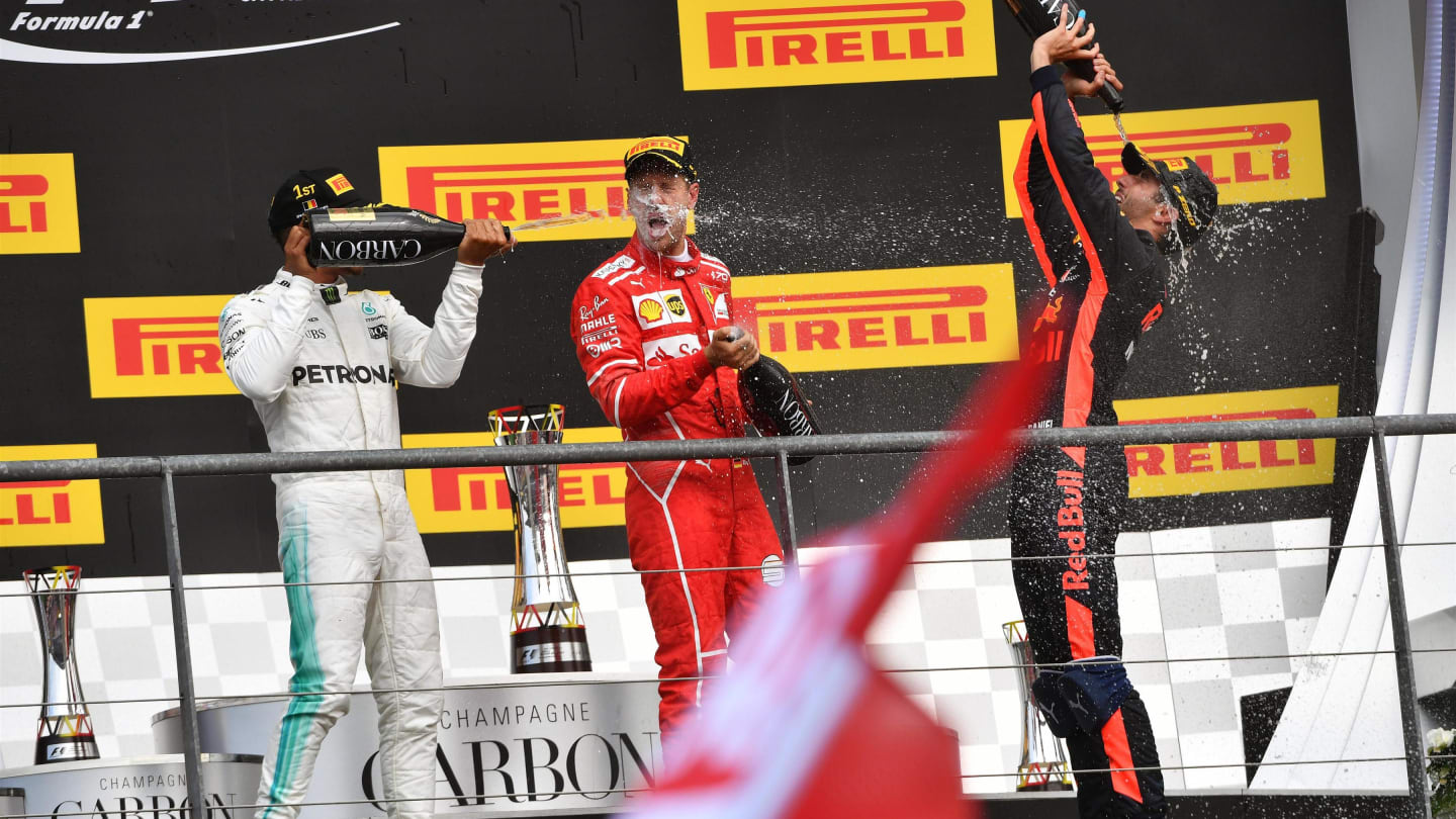 Lewis Hamilton (GBR) Mercedes AMG F1, Sebastian Vettel (GER) Ferrari and Daniel Ricciardo (AUS) Red