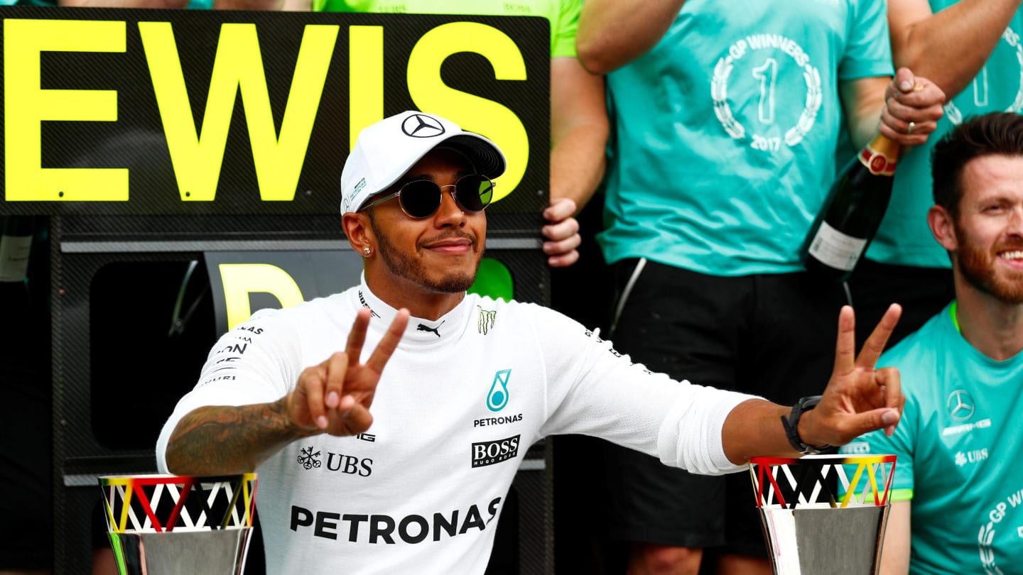 Lewis Hamilton (GBR) Mercedes AMG F1 celebrates with the team at Formula One World Championship,