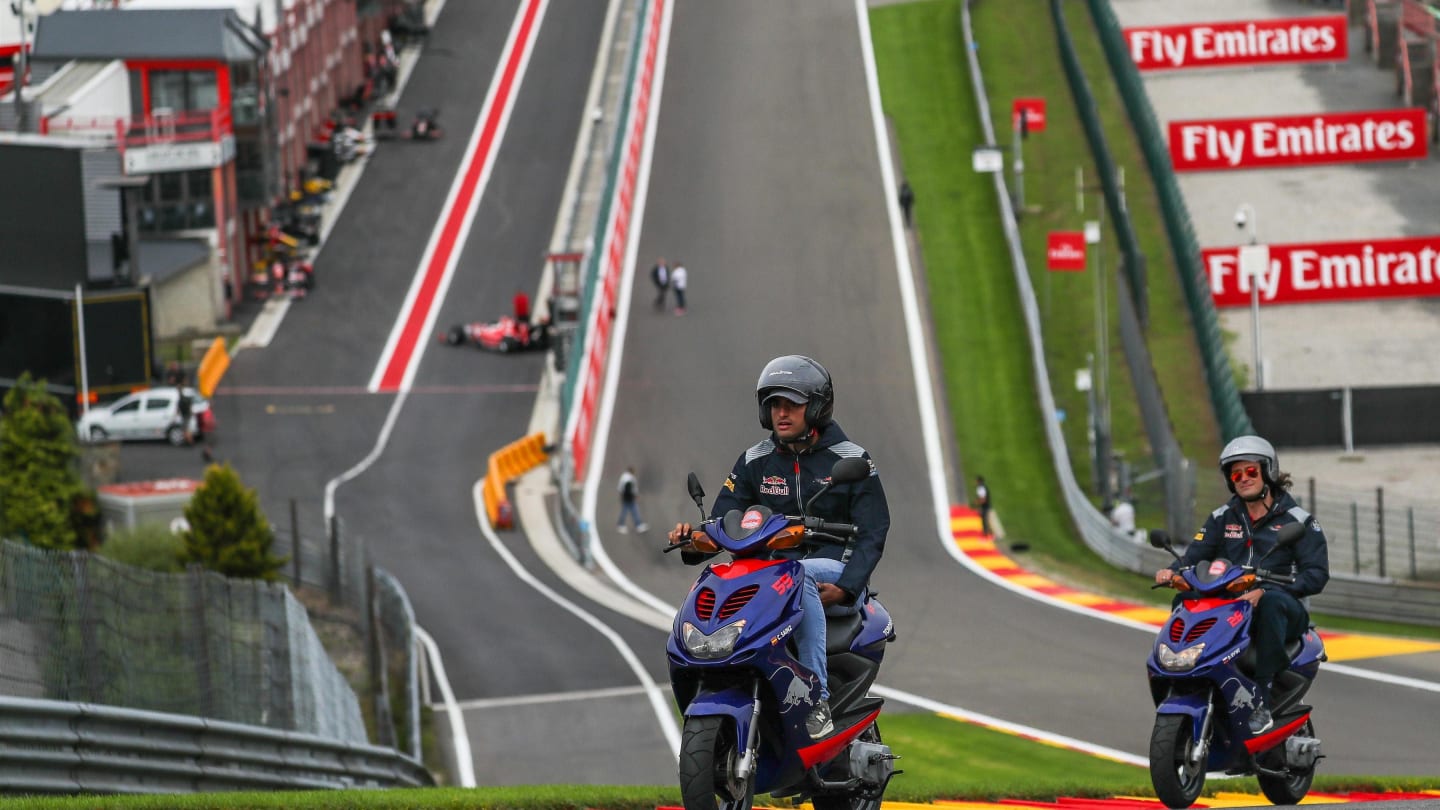 Carlos Sainz jr (ESP) Scuderia Toro Rosso rides the track on a scooter at Formula One World Championship, Rd12, Belgian Grand Prix, Preparations, Spa Francorchamps, Belgium, Thursday 24 August 2017. © Sutton Images