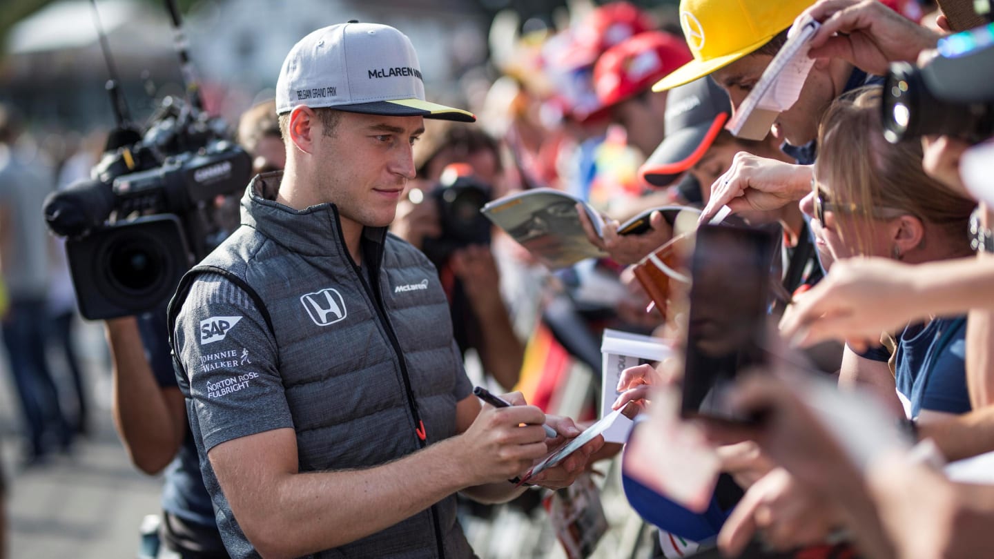 Stoffel Vandoorne (BEL) McLaren signs autographs for the fans at Formula One World Championship,